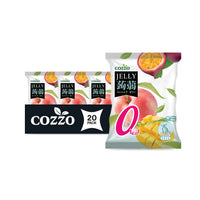 Healthy snacks, Bulk candy, Snack variety packs — Cozzo Jelly 20-pack squeeze pouch with a large “0 kcal” label, shown with three smaller pouches behind and a “20 PACK” banner; packaging features a peach, a passion fruit half, and diced mango near the bottom.

سناكات صحية، حلويات بالجملة، باكيت سناكات مشكلة — كيس جيلي Cozzo قابل للعصر (باك 20) مع عبارة كبيرة “0 كالوري”، وثلاثة أكياس صغيرة بالخلف مع شريط “20 PACK”؛ التغليف يظهر خوخ، ونصف ثمرة باشن فروت، وقطع مانجا في الأسفل.