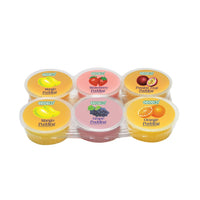 Six-cup COCON pudding tray in a clear plastic pack with round lids showing mixed fruit flavors: mango, strawberry, passion fruit, grape, and orange; bright fruit icons on each lid. Wholesale snacks سناكات جملة, Healthy snacks سناكات صحية, Low calorie snacks سناكات قليلة السعرات.