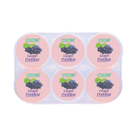 Six-cup COCON grape pudding tray in a clear plastic pack; all six round lids are light pink with a grape cluster icon and the words ‘Grape Pudding’ on each cup. Wholesale snacks سناكات جملة, Healthy snacks سناكات صحية, Low calorie snacks سناكات قليلة السعرات.